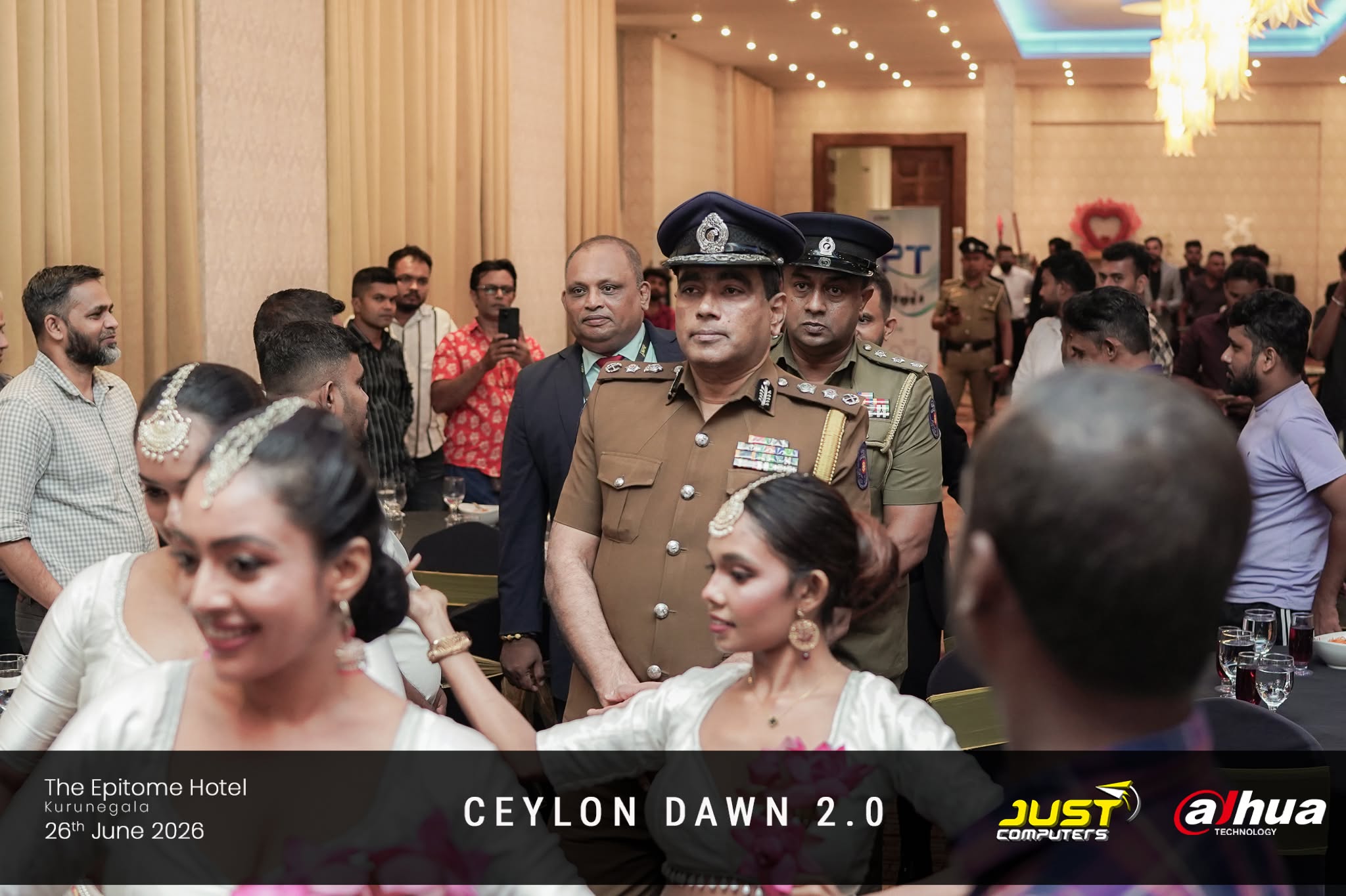Chief guests in police uniform being escorted into the ballroom by dancers at The Epitome Hotel